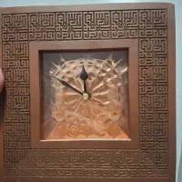 ساعت مسی حکاکی شده