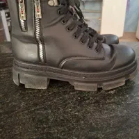 پوتین|کیف، کفش، کمربند|شاهین دژ, |دیوار