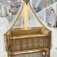فروش تخت گهواره کنار مادر واویز موزیکال