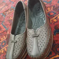 کفش زنانه|کیف، کفش، کمربند|رشت, فلسطین|دیوار