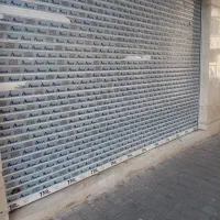 مغازه بر خیابان شکوفه 18 متری