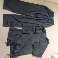 لباس باشگاه رزمی همراه با لوازم مبارزه