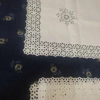 تعدادی روپشتی یا رومیزی هویه کاری شده کار دست نو