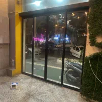 دراتوماتیک شیشه ای نردهشیشه ای جانپناه کرکره برقی