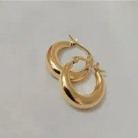 گوشواره حلقه ای و انگشتر چکشی