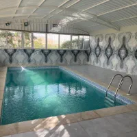 اجاره باغ با استخرآب گرم بیلیارد فول امکانات کد124|اجارهٔ کوتاهمدت ویلا و باغ|شیراز, باغشهر قصر سبز|دیوار