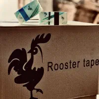 چسب پهن شیشه ای پنج سانتی نواری تحریر خروس نشان