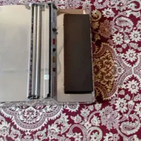 یک عدد دستگاه سلفون کش و یک عدد فن هواکش بزرگ|پنکه و تصفیهکنندهٔ هوا|تبریز, |دیوار