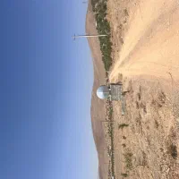 زمین کشاورزی روبه روی گاوداری جاده سامان