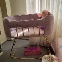 گهوار نوزاد و تخت بغل مادر