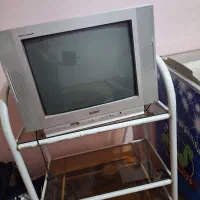 تلویزیون و زیر تلویزیونی   21اینچ