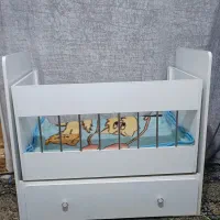 تخت گهواره ای کودک