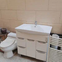 روشویی و توالت فرنگی و خشک کن حوله