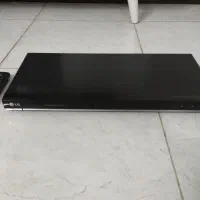 یه دی وی دی پلیر ال جی بایه پیراهن مجلسی تن نرفته