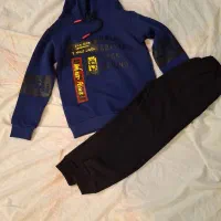 البسه|کفش و لباس بچه|نیشابور, بزرگمهر|دیوار