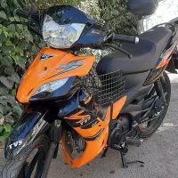 تی وی اس راکز ۱۴۰۰ نارنجی نیروموتور