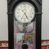 یکدستگاه ساعت دیواری کاملا سالم