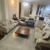 مبلمان ۷ نفره به همراه جلو مبلی و دو عدد عسلی