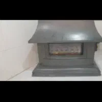 بخاری گازی شومینه دار