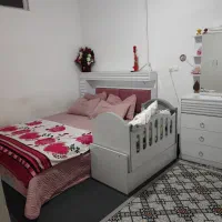 گهواره کنار تخت مادر