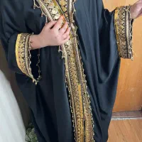 عبا اماراتی|لباس|شوش, |دیوار