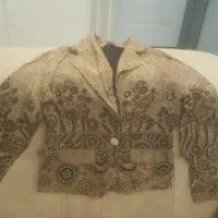 لباس مجلسی|لباس|مشهد, تربیت (صدف)|دیوار