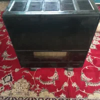 بخاری و دسته جارو برقی