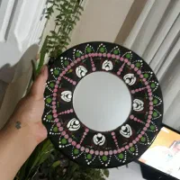 آینه نقطه کوبی شده