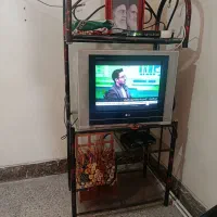 تلویزیون همراه میز