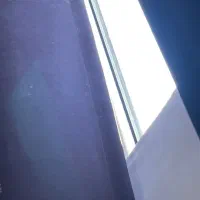 پرده‌ی سورمه‌ای و حباً منصورا فروشی هومان