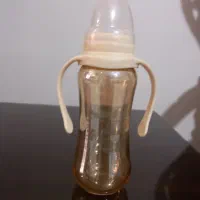 شیشه شیر ،شیشه ای اصل همراه سرپستونک پلمپ