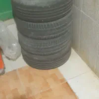 لاستیک پژو همراه رینگ وقالپاق