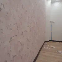 شاگرد وردست نصاب کاغذدیواری