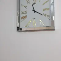 ساعت دیواری اینه ای