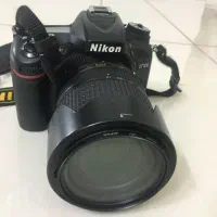 دوربین نیکون D7100 با لنز 18.140 در حد نو