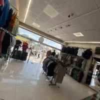 شاگرد در پوشاک‌ برادران کوهی