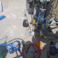 کولر سازی نصب و گاز گیری کولر پنجره ای دوتیکه