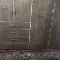 یک ساختمان 90متری یک اتاق خواب 100متر حیاط