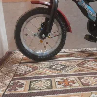 دوچرخه ۱2 قرمز تمیز و کاملآ سالم|دوچرخه، اسکیت، اسکوتر|اصفهان, شهید رجایی|دیوار