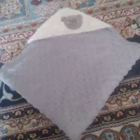 پتوی دور پیچ نوزاد