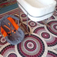 گهواره کنار تختی و کریر