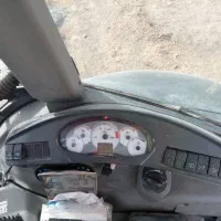 بیل بکهو نیوهلند 115 چرخ بزرگ|خودرو سنگین|قروه, |دیوار