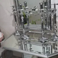 آیینه شمعدان و صندلی