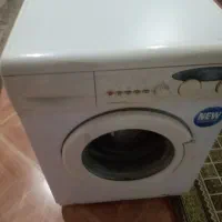لباسشویی کن وود نیاز به تعمیر