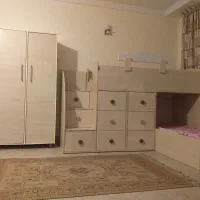 تخت دو طبقه با کمد