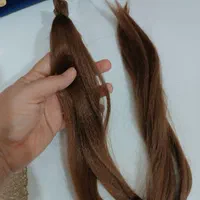یک دسته موی مصنوعی رنگ عسلی