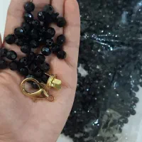 مروارید به همراه قفل کیف
