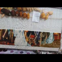 تابلوفرش تقریبا نزدیک به نصفه بافته شده