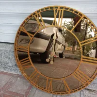 ساعت دیواری آینه ای