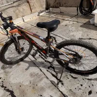 دوچرخه طوسی و نارنجی دست دو